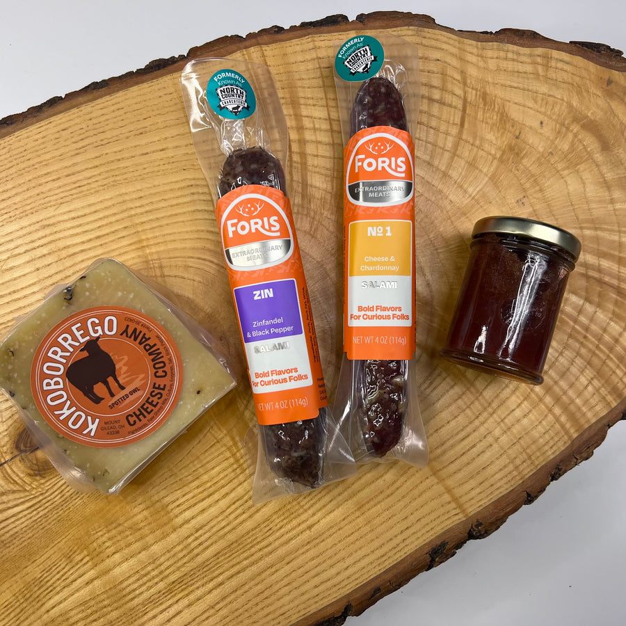 Foris Meats Wine Lovers Charcuterie Kit with gourmet salamis and locally sourced cheese and jam.