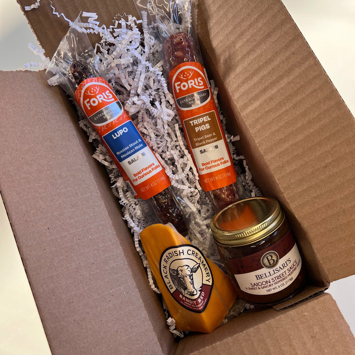 Beer Lovers Charcuterie Kit, featuring 2 of our fan-favorite salamis, each flavored with a different Ohio craft beer, along with a robust cheddar cheese, and a deliciously tangy mustard made with a Pale Ale.