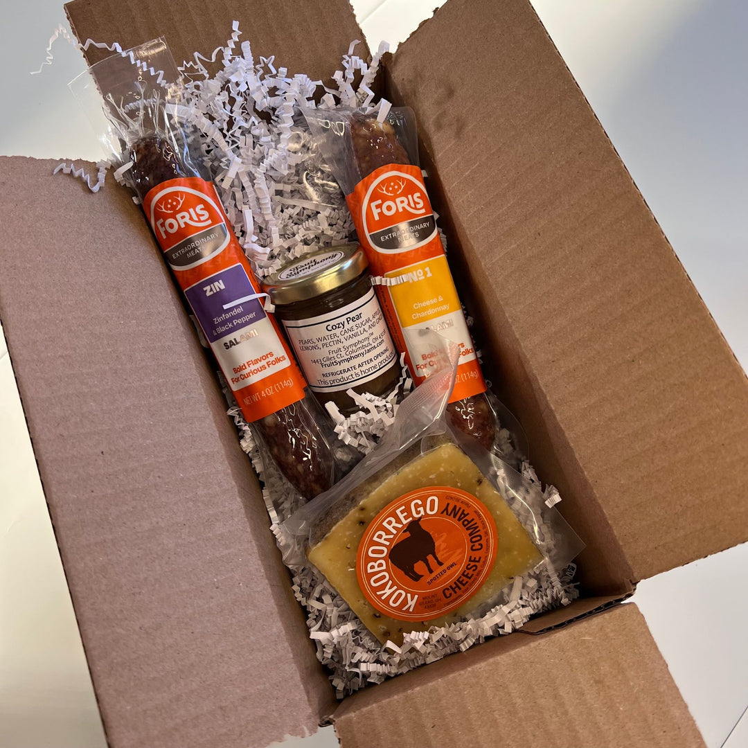 Foris Meats Wine Lovers Charcuterie Kit with gourmet salamis and locally sourced cheese and jam.
