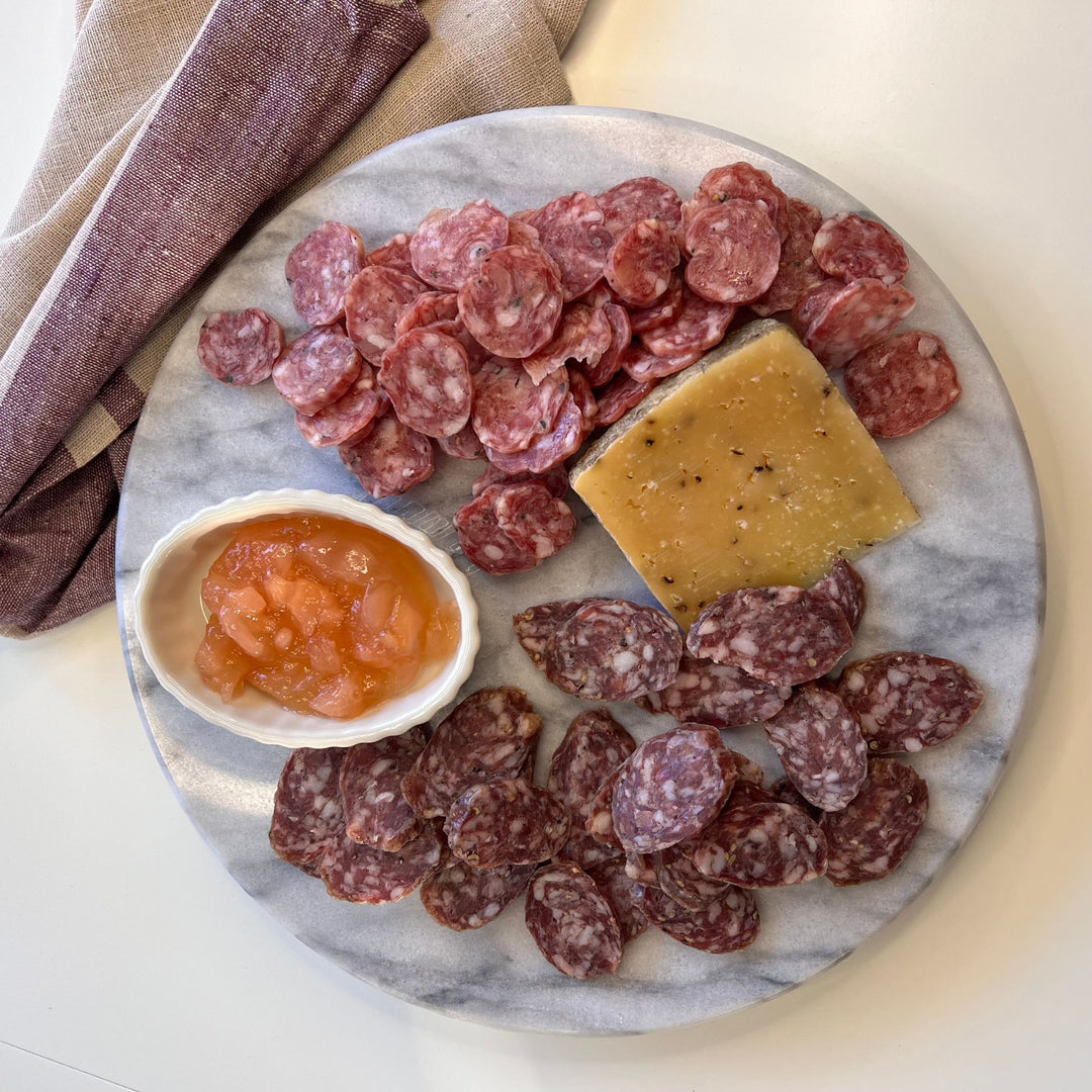 Foris Meats Wine Lovers Charcuterie Kit with gourmet salamis and locally sourced cheese and jam.